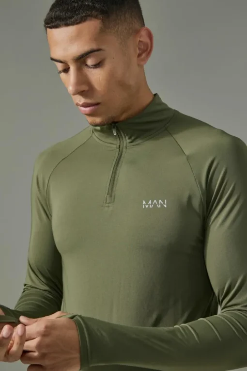 Man Active Raglan Muscle Fit 1/4 Zip Top