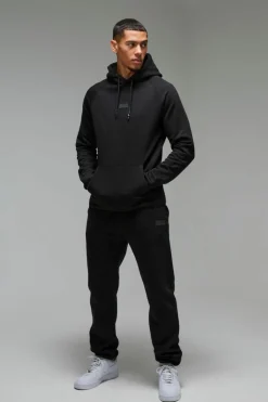 Man Active Regular Fit Badge Tracksuit