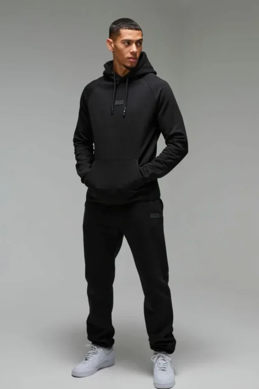 Man Active Regular Fit Badge Tracksuit
