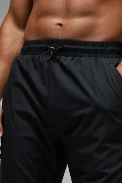 Man Active Shower Resist Tapered Trail Jogger