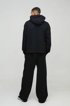 Oversized Boxy Varsity Worldwide Printed Raw Hem Hoodie