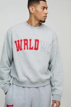 Oversized Boxy Worldwide Distressed Applique Sweatshirt