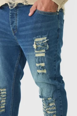 Plus Skinny Jeans With All Over Rips