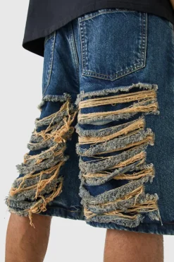 Relaxed Rigid Extreme Ripped Denim Jorts In Antique Blue