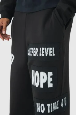 Relaxed Wide Leg Graffiti Applique Distressed Joggers