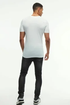Skinny Stretch All Over Rip & Repair Paint Splatter Jeans