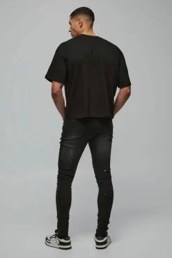 Super Skinny Distressed Paint Splat Jeans